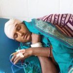 एक महिलामाथी निर्घात कुटपिट